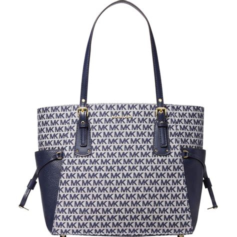 michael kors east west tote bag|signature voyager east west tote.